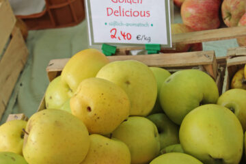 Golden Delicious apples in a fruit crate