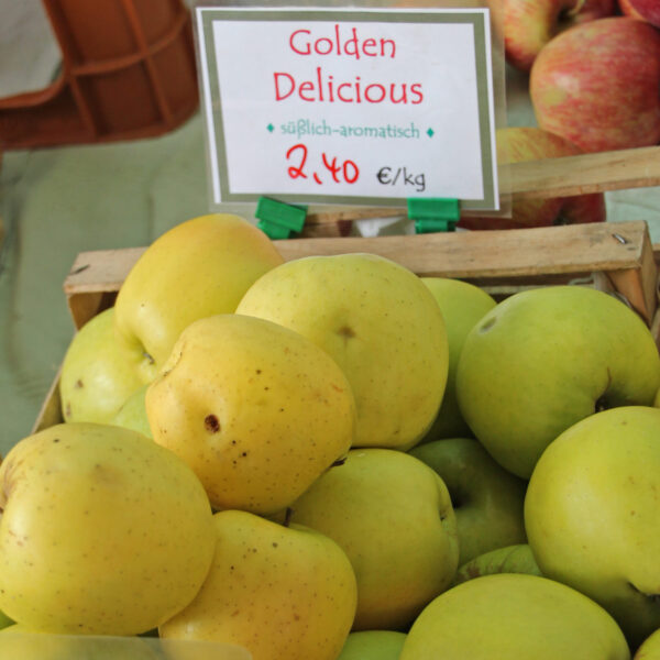 Golden Delicious apples in a fruit crate