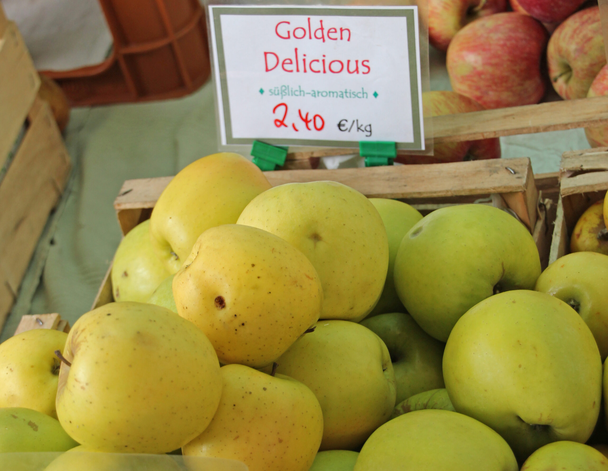 Golden Delicious apples in a fruit crate